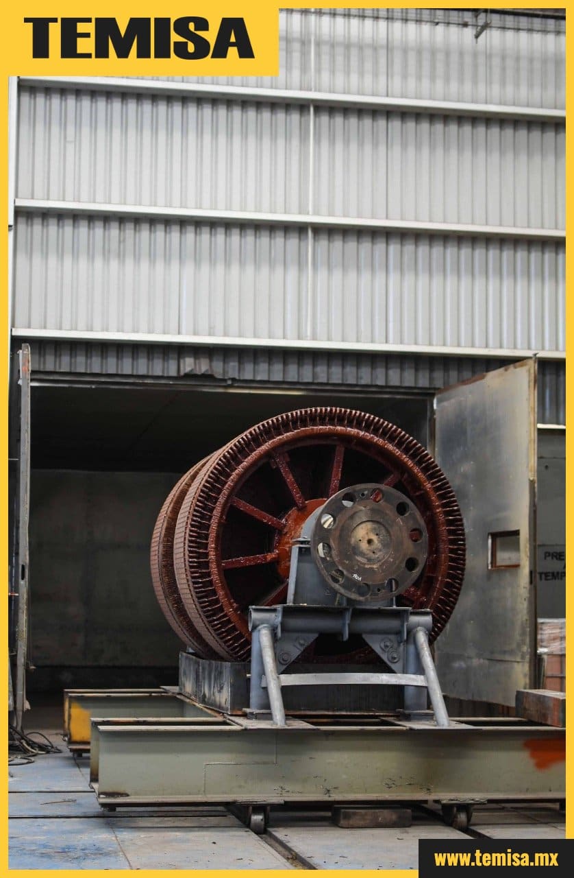Rotor impregnado con barniz ingresando al horno de curado